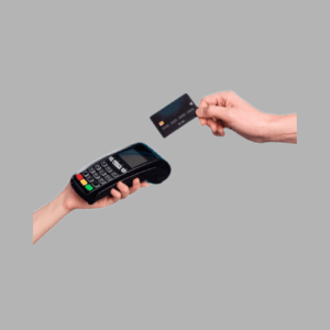 Hand holding a debit card approaching a debit card reader to show that Nature's Gifts accepts debit cards.